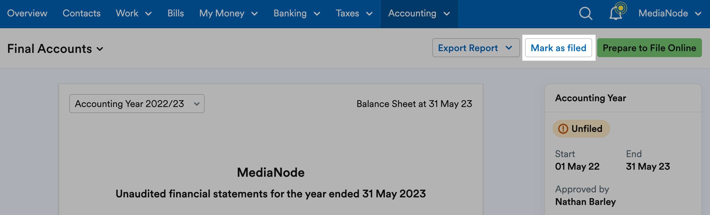 'Mark as filed' button highlighted above the report.