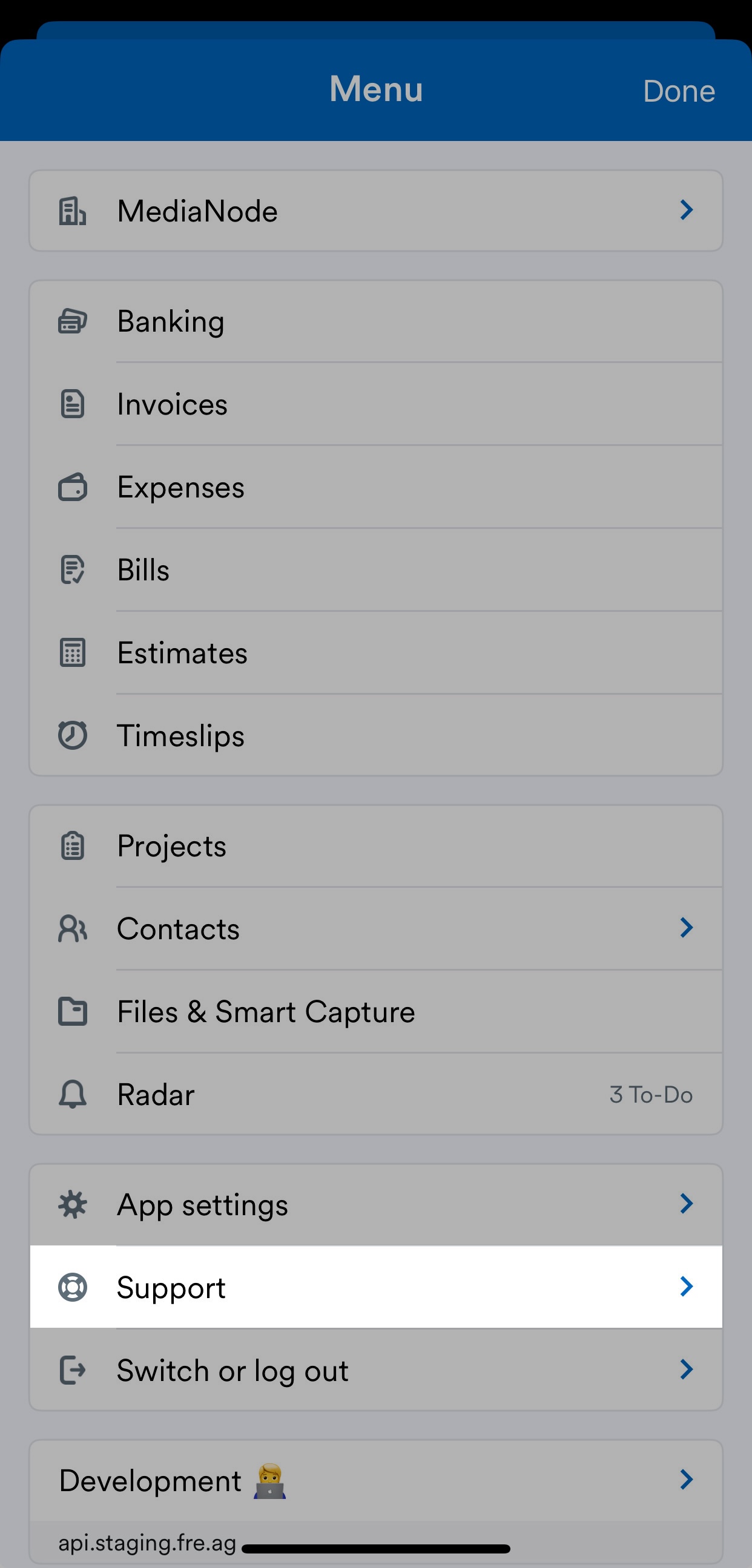 FreeAgent mobile app menu with Settings highlighted