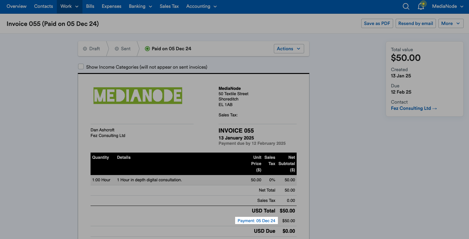 Payment link highlighted on invoice next to the invoice total.